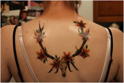 Attractive-Lily-on-Horns-Tattoo-Designs