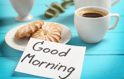 Delicious breakfast and GOOD MORNING greeting note on wooden table closeup